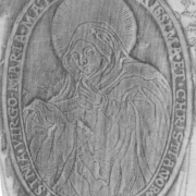 Darstellung der Maria in einer ovalen Rahmung. Platte